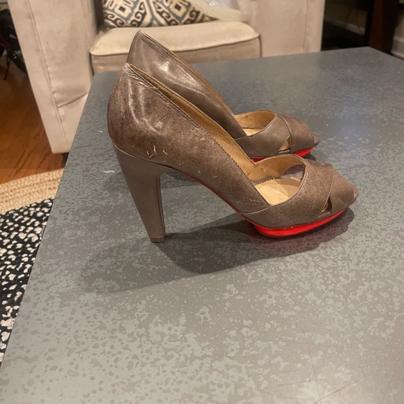 Unique heels. Worn once. Bright colored underneath front of shoe. - Picture 2 of 3